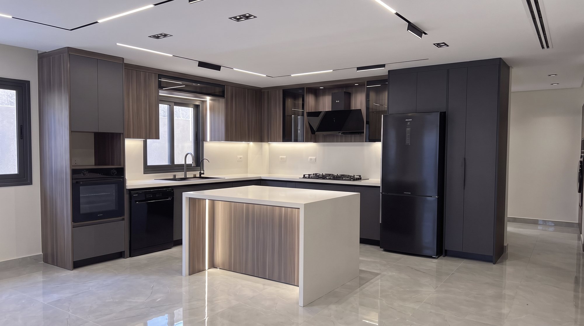 DHOME graphite kitchen with a walnut and quartz island